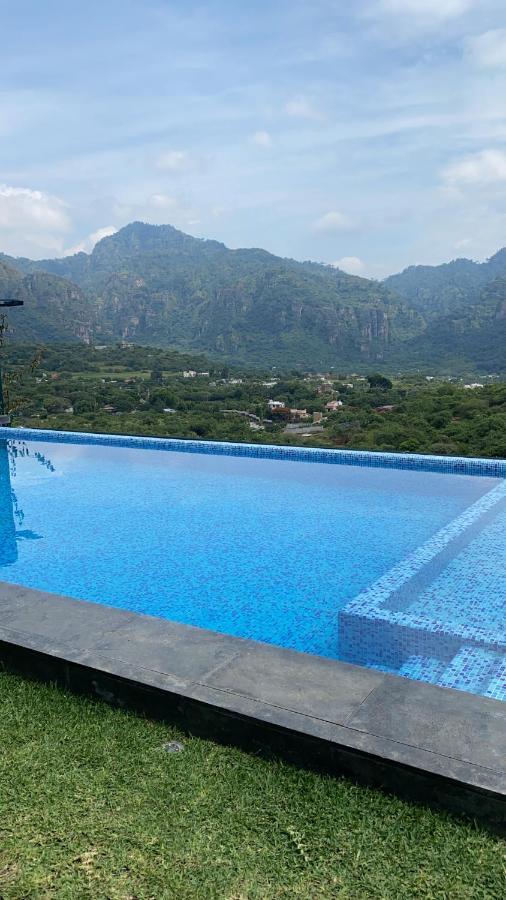 Hotel Macpalo เตโปซตลัน ภายนอก รูปภาพ